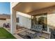 Covered patio with stylish outdoor furniture, perfect for relaxing and entertaining with easy access to the home at 6846 S 26Th Pl, Phoenix, AZ 85042