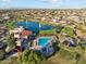Resort-style community pool and lake provide luxury amenities for homeowners at 7511 S Parkcrest St, Gilbert, AZ 85298