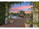 Relaxing backyard featuring a beautiful pool, desert landscaping, and lounge chairs, perfect for enjoying Arizona sunsets at 7511 S Parkcrest St, Gilbert, AZ 85298