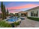 Stunning backyard showcasing a sparkling pool and spa combo, perfect for relaxation and enjoyment at 7511 S Parkcrest St, Gilbert, AZ 85298