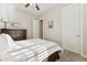 Bedroom featuring neutral walls, carpet, and a bed with plenty of natural light at 7511 S Parkcrest St, Gilbert, AZ 85298