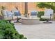 Inviting outdoor fire pit area with comfortable seating, perfect for cozy evenings at 7511 S Parkcrest St, Gilbert, AZ 85298