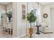 Cozy living area with neutral tones, stylish furniture, and natural light streaming through the window at 7511 S Parkcrest St, Gilbert, AZ 85298