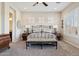 Spacious main bedroom with comfortable carpet, a wrought iron bed, and abundant light at 7511 S Parkcrest St, Gilbert, AZ 85298