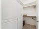 Organized walk-in closet with built-in shelves, rods, and extra storage at 7511 S Parkcrest St, Gilbert, AZ 85298