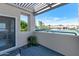 Serene balcony overlooking the tennis courts, perfect for enjoying the outdoor view at 7710 E Gainey Ranch Rd # 206, Scottsdale, AZ 85258