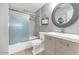 Contemporary bathroom featuring modern fixtures, a shower with glass door, and stylish vanity at 7710 E Gainey Ranch Rd # 206, Scottsdale, AZ 85258