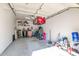 Well-organized garage space with overhead storage and ample room for parking and storage solutions at 7710 E Gainey Ranch Rd # 206, Scottsdale, AZ 85258