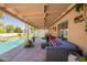 Covered patio with a pool and ample seating area at 823 N 81St St, Mesa, AZ 85207