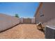 Side yard with gravel, a gate, and space for storage or outdoor activities at 823 N 81St St, Mesa, AZ 85207