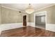 Well-lit dining room featuring classic hardwood floors and stylish wall paneling at 840 E 2Nd St, Mesa, AZ 85203