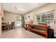 Bright garage features a workbench, pegboard, window, and an exit to the outdoor space at 840 E 2Nd St, Mesa, AZ 85203