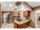 Open kitchen with stainless steel appliances and granite countertops at 840 E 2Nd St, Mesa, AZ 85203