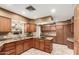 Large kitchen featuring granite countertops, ample cabinet space, and an island at 840 E 2Nd St, Mesa, AZ 85203
