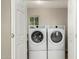 A convenient laundry room featuring modern, front-load washer and dryer appliances at 840 E 2Nd St, Mesa, AZ 85203