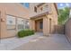 View of a well-maintained front yard with desert landscaping and partial view of the home's entrance at 8503 W Coyote Dr, Peoria, AZ 85383