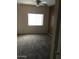 Carpeted bedroom with ceiling fan and window for natural light at 1015 S Val Vista Dr # 8, Mesa, AZ 85204