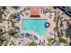 Aerial view of the community pool and lounge area with a fountain and several seating options at 11375 E Sahuaro Dr # 1008, Scottsdale, AZ 85259