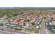 Extensive aerial view of a neighborhood with a community pool at 11375 E Sahuaro Dr # 1008, Scottsdale, AZ 85259
