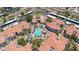 An aerial view of the community pool and surrounding buildings at 11375 E Sahuaro Dr # 1008, Scottsdale, AZ 85259