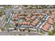 Stunning aerial view of the community featuring a pool, clubhouse, and covered parking at 11375 E Sahuaro Dr # 1008, Scottsdale, AZ 85259