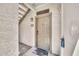 Entryway with a door marked '1008', leading to the unit, and adjacent to an exterior staircase at 11375 E Sahuaro Dr # 1008, Scottsdale, AZ 85259