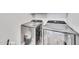 The laundry room includes modern side-by-side washer and dryer units with stainless steel finishes at 11375 E Sahuaro Dr # 1008, Scottsdale, AZ 85259