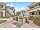 A shared outdoor grill and seating area are nestled within the beautifully maintained grounds at 11375 E Sahuaro Dr # 1008, Scottsdale, AZ 85259