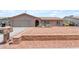 Inviting single-story home featuring desert landscaping and a two-car garage at 12029 N 44Th Dr, Glendale, AZ 85304