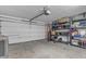 Spacious garage with ample storage shelving and plenty of room for parking at 12029 N 44Th Dr, Glendale, AZ 85304