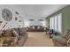 Inviting living room featuring comfortable couches, soft lighting, and a calming color palette at 12029 N 44Th Dr, Glendale, AZ 85304