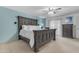 Calming main bedroom with a king-size bed, soft carpet, and a sliding glass door at 12029 N 44Th Dr, Glendale, AZ 85304