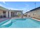Backyard swimming pool with stairs, surrounded by a patio area and complemented by a covered lounge space at 12029 N 44Th Dr, Glendale, AZ 85304