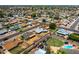 Located in a Gathering-friendly neighborhood, this property features a large lot with lush landscaping at 1407 W Chilton St, Chandler, AZ 85224