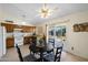 Cozy kitchen with eat-in dining, wood cabinetry, and a ceiling fan at 1407 W Chilton St, Chandler, AZ 85224