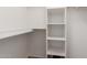 Walk-in closet with shelving and carpeted floor at 14300 W Bell Rd # 6, Surprise, AZ 85374