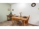 Welcoming dining area featuring a wooden table set, stylish decor, and tile floors at 14300 W Bell Rd # 6, Surprise, AZ 85374