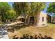 Exterior shot showcasing the desert-style landscaping and appealing architecture of the residence at 14300 W Bell Rd # 6, Surprise, AZ 85374