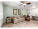Comfortable living room with neutral tones, tile flooring, and natural light at 14300 W Bell Rd # 6, Surprise, AZ 85374