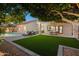 Inviting backyard with a swimming pool, lush landscaping, and outdoor seating areas for relaxation at 16238 N 58Th St, Scottsdale, AZ 85254