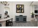 Elegant dining area with a stylish chandelier, and modern accents, perfect for Gathering gatherings at 16238 N 58Th St, Scottsdale, AZ 85254