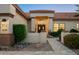 Beautiful home entrance with a meticulously maintained yard and covered doorway creating curb appeal at 16238 N 58Th St, Scottsdale, AZ 85254