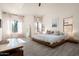 Serene main bedroom featuring neutral colors, modern platform bed, and natural light at 16238 N 58Th St, Scottsdale, AZ 85254