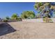Large backyard enclosed by a block wall, providing privacy and security for outdoor activities and landscaping possibilities at 16421 N 34Th Ave, Phoenix, AZ 85053