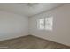 Bright bedroom with ceiling fan and wood-look floors at 16421 N 34Th Ave, Phoenix, AZ 85053
