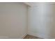 Empty walk-in closet features neutral walls and floors at 16421 N 34Th Ave, Phoenix, AZ 85053