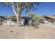 Charming home featuring a brick facade, mature trees, and well-maintained landscaping at 16421 N 34Th Ave, Phoenix, AZ 85053