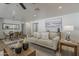 Open-concept living area with a dining table, contemporary design, and comfortable seating at 16421 N 34Th Ave, Phoenix, AZ 85053