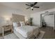 Serene main bedroom showcasing a tufted headboard and contemporary décor at 16421 N 34Th Ave, Phoenix, AZ 85053