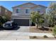 Charming two-story home featuring a paver driveway, two car garage and low maintenance desert landscaping at 18400 W Ipswitch Way, Surprise, AZ 85374